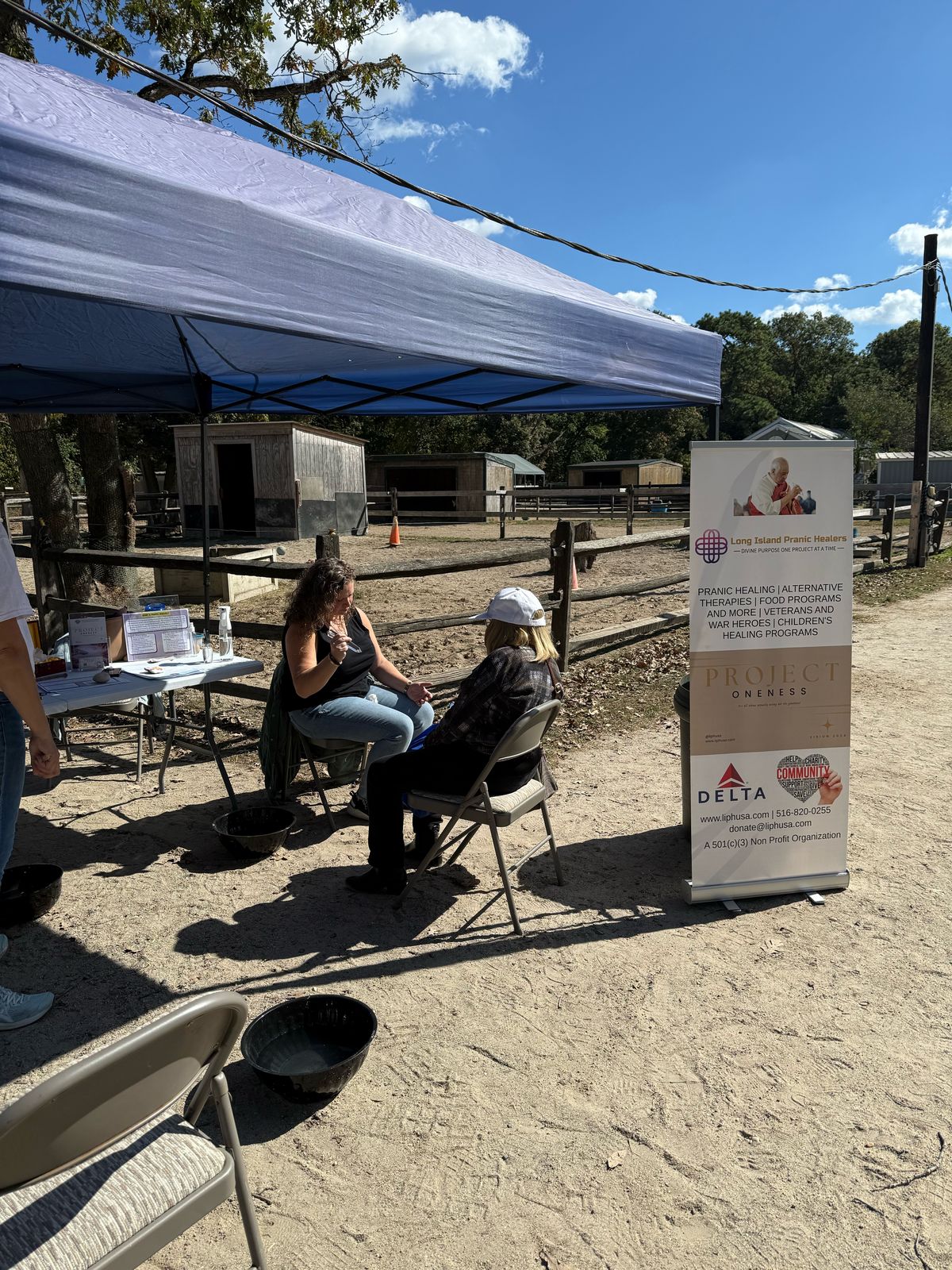 Volunteers at the LIPH tent welcoming visitors