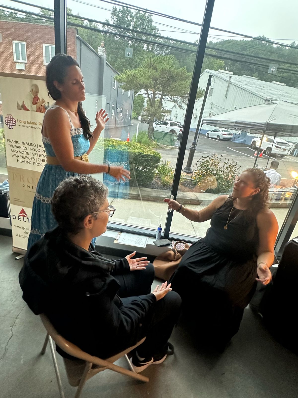 A healing session at a Long Island Pranic Healers event